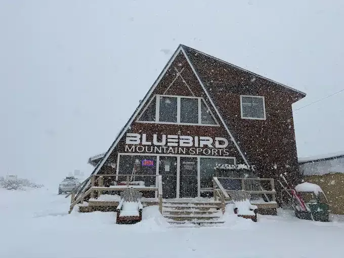 A-frame ski shop in heavy snowfall