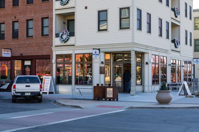 Holiday-decorated cafes along a downtown street