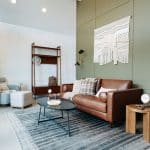 Modern living room with brown leather sofa