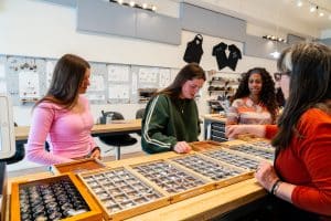 Women browsing rings in a jewelry store