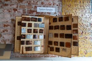 Display board of engraved metal texture samples